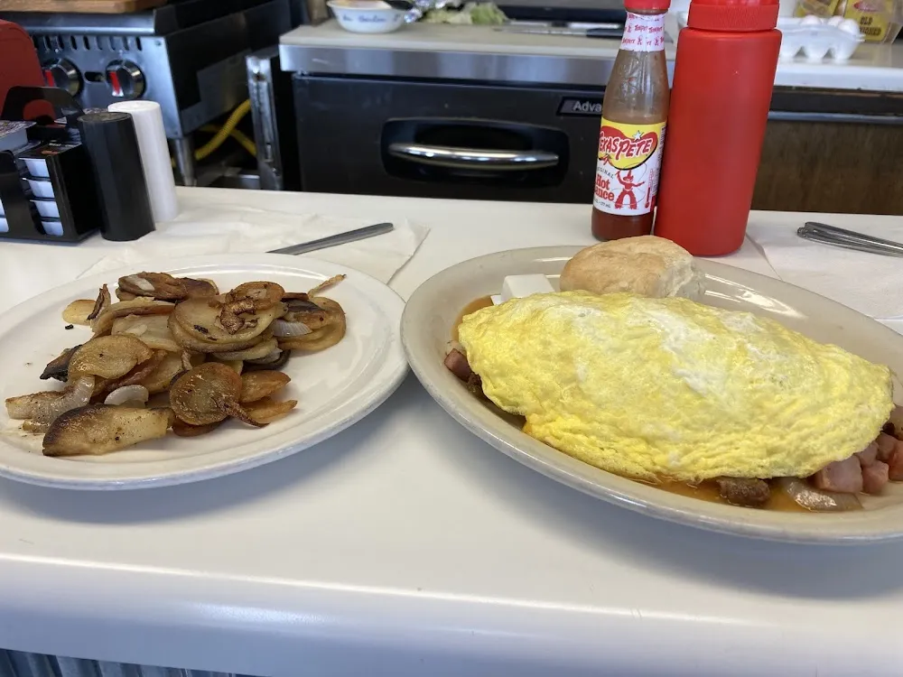 Trash Omelet Biscuit and Home Fries